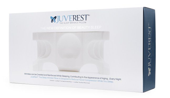 Box for the Juverest Sleep Wrinkle Pillow, displaying product image and text that reads, "The new definition of beauty sleep. Wrinkles can be created and reinforced while sleeping, contributing to the appearance of aging...every night. Check out a JuveRest Pillow review to see how it can transform your sleep.