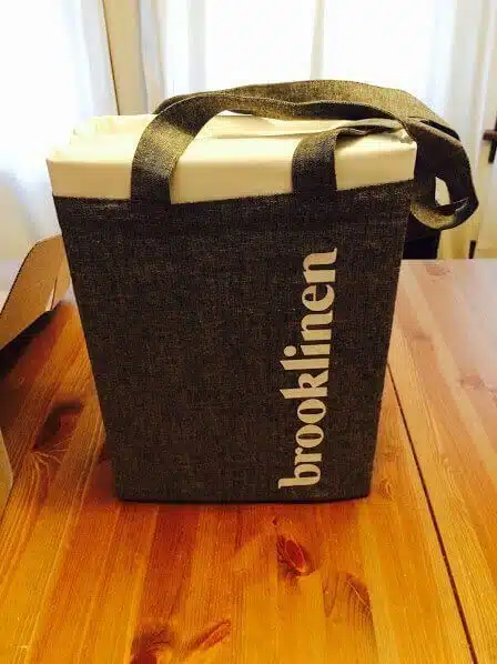 Brooklinen sheet set laid out on a bed