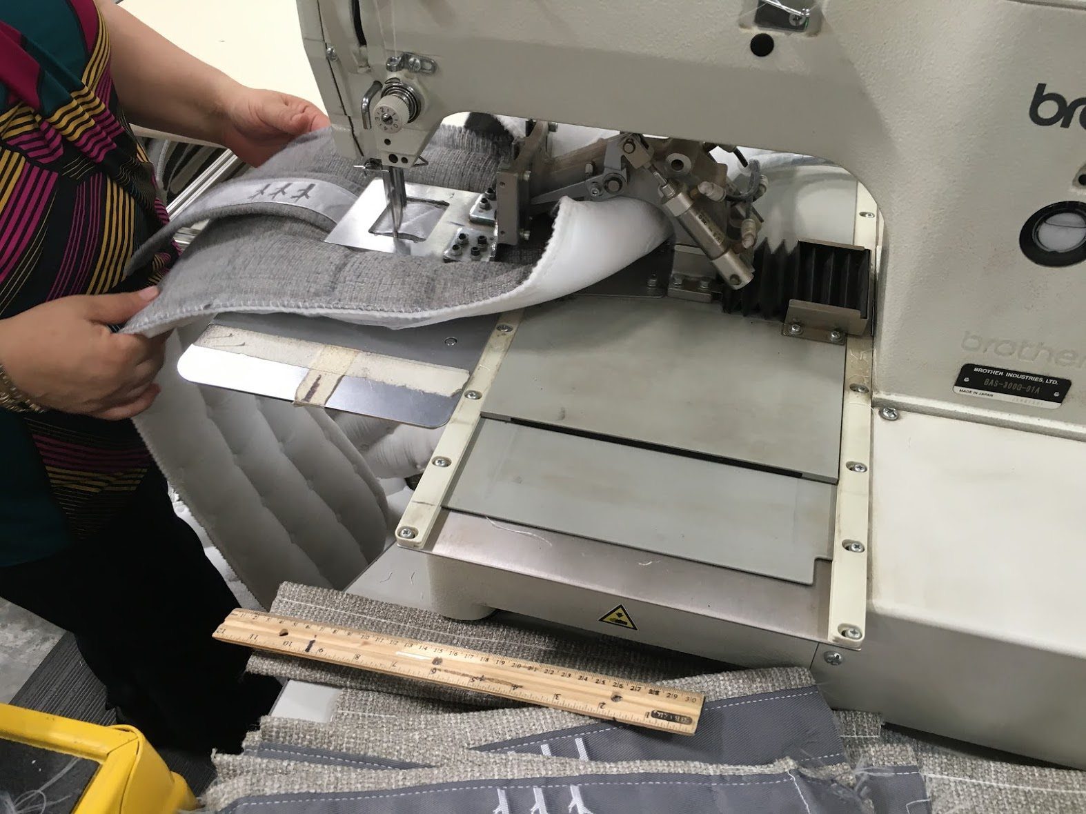 Hand sewing at Brentwood Factory