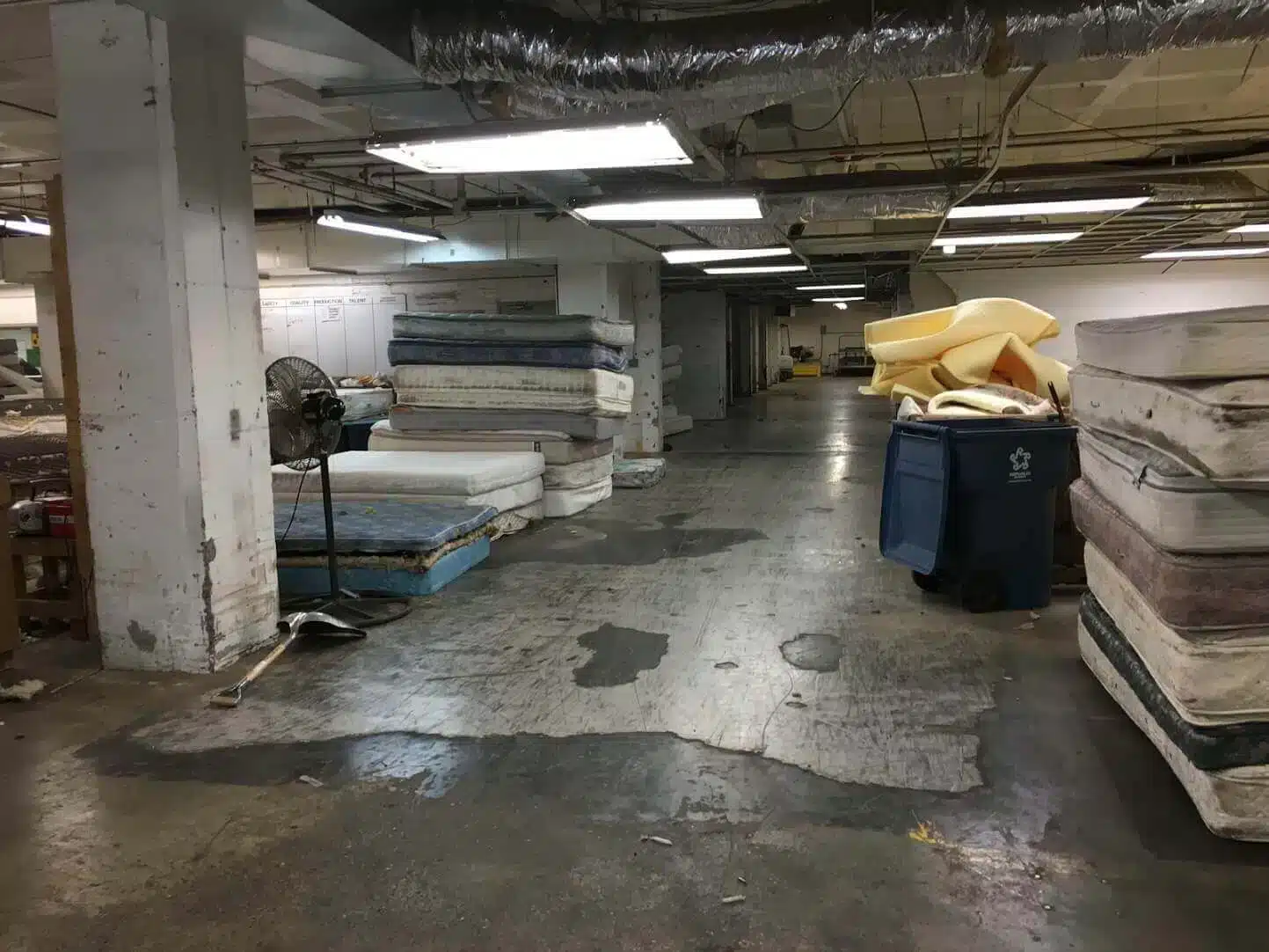 Stack of used mattresses waiting to be recycled