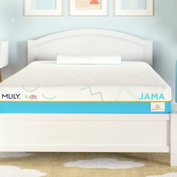 A child's bedroom with a white bed frame, a twin-size Mlily JAMA 7" Mattress, and a matching pillow. The room features a blue armchair, a white nightstand with a teddy bear on top, and soft blue walls adorned with framed artwork.