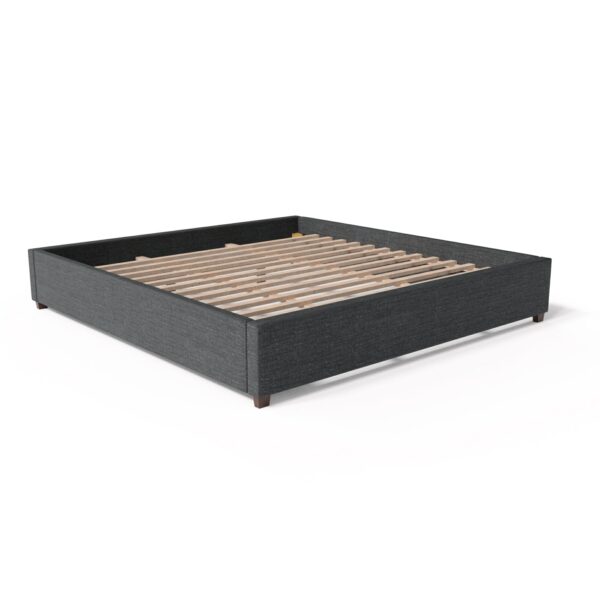 A dark grey upholstered bed frame with a minimalist design. It features low wooden legs and wooden slats for mattress support, giving it a sleek, modern appearance. The bed frame is shown on a plain white background.