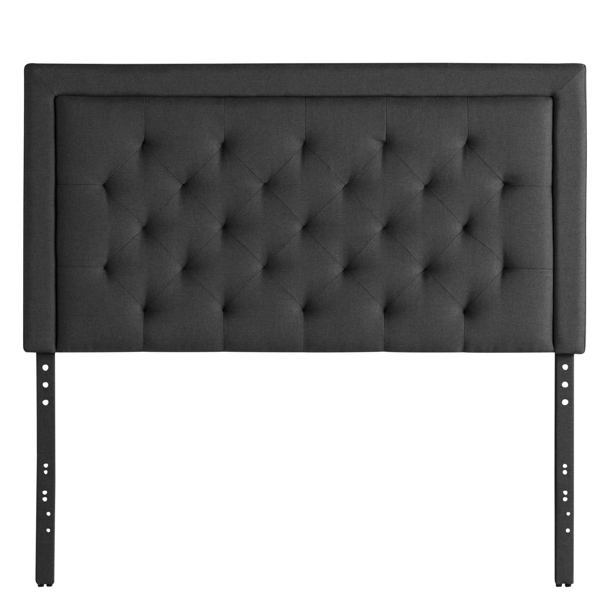 The Hennessy Headboard is a black, tufted headboard with a rectangular design. It boasts a padded surface adorned with a diamond-patterned, button-tufted texture. Two black metal support legs are attached at the bottom for easy mounting to a bed frame.