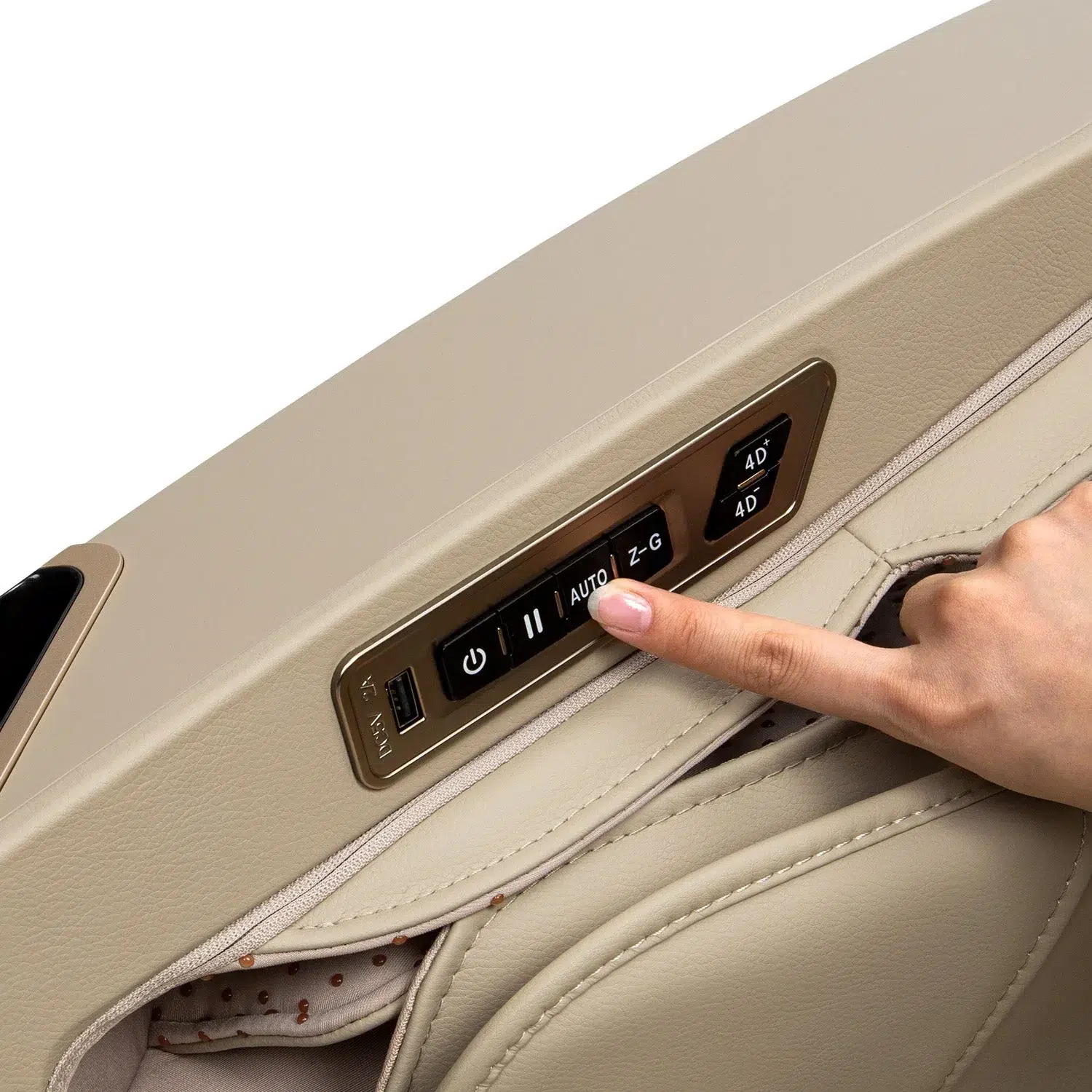 A hand is shown pressing a button on the Osaki 4D Maestro LE 2.0's control panel, which is embedded in a beige leather armrest. The control panel features several horizontally arranged buttons, text, and symbols.