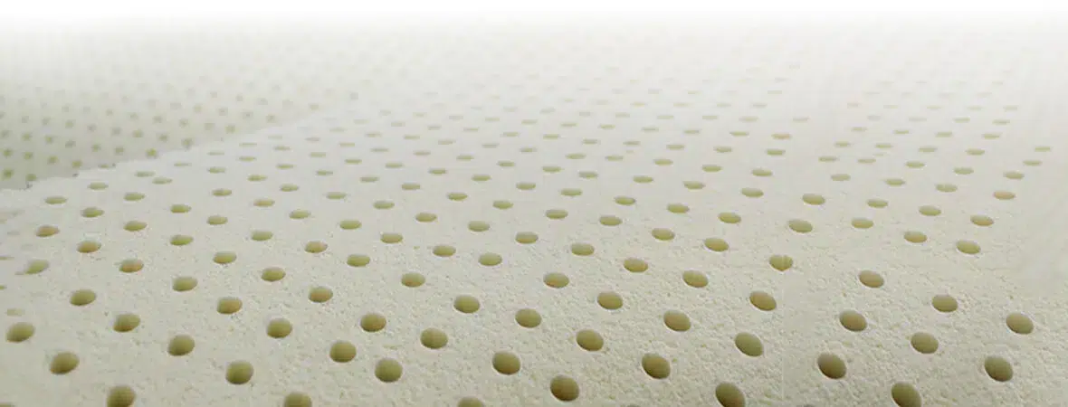 Natural latex layers with pinholes for breathability