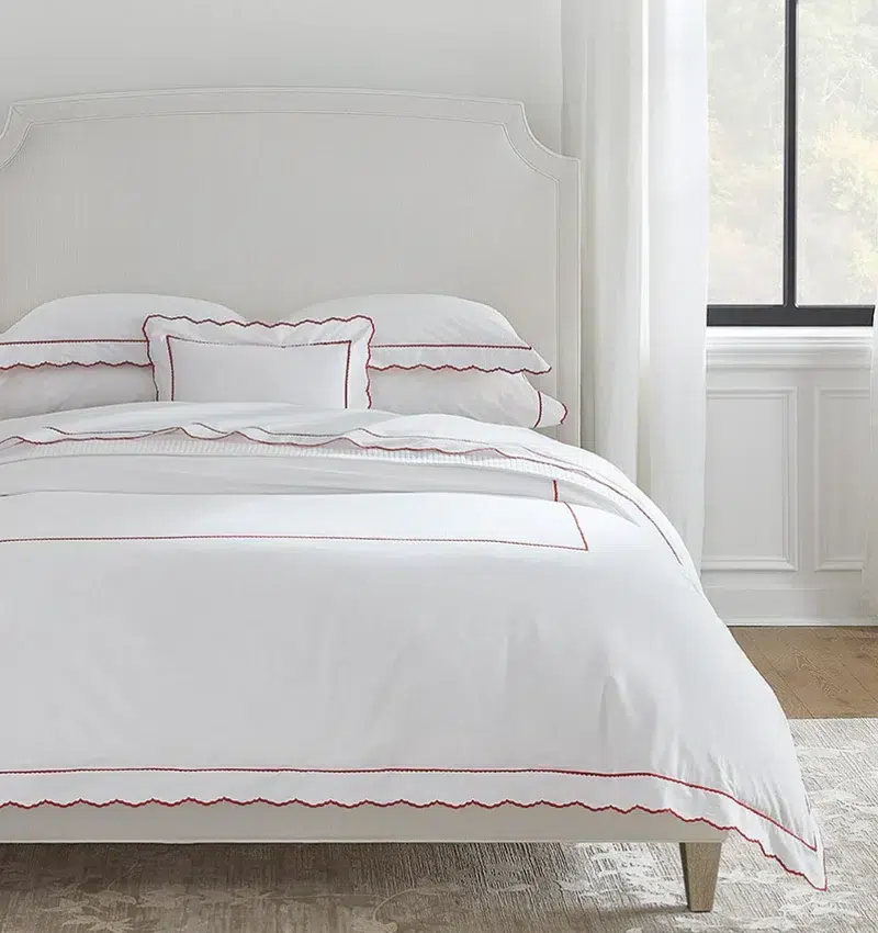 Sferra sheets dressed on a modern bed