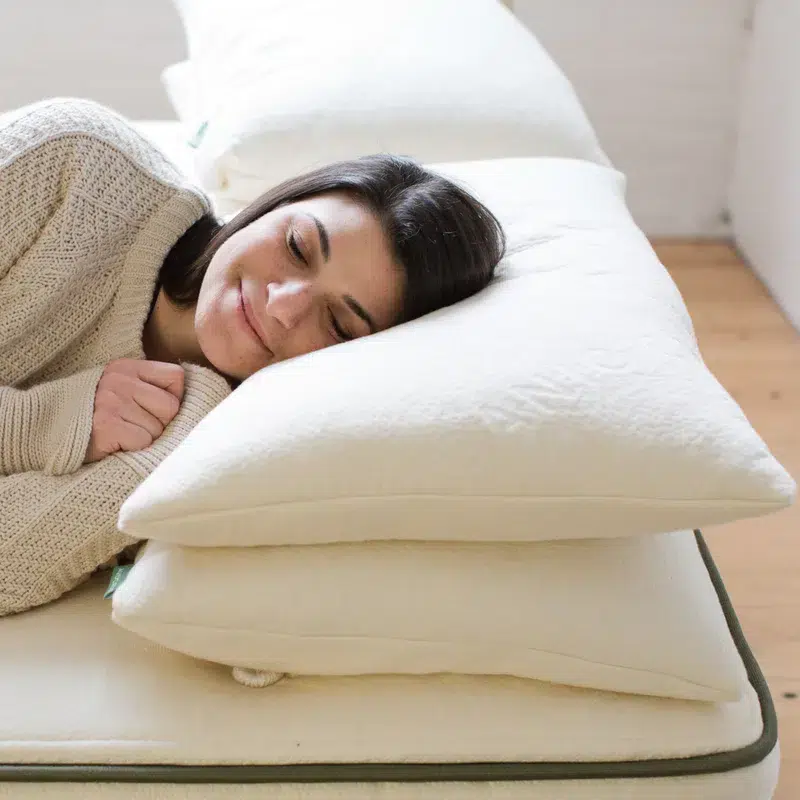 Avocado pillow on the Avocado mattress in a bright room