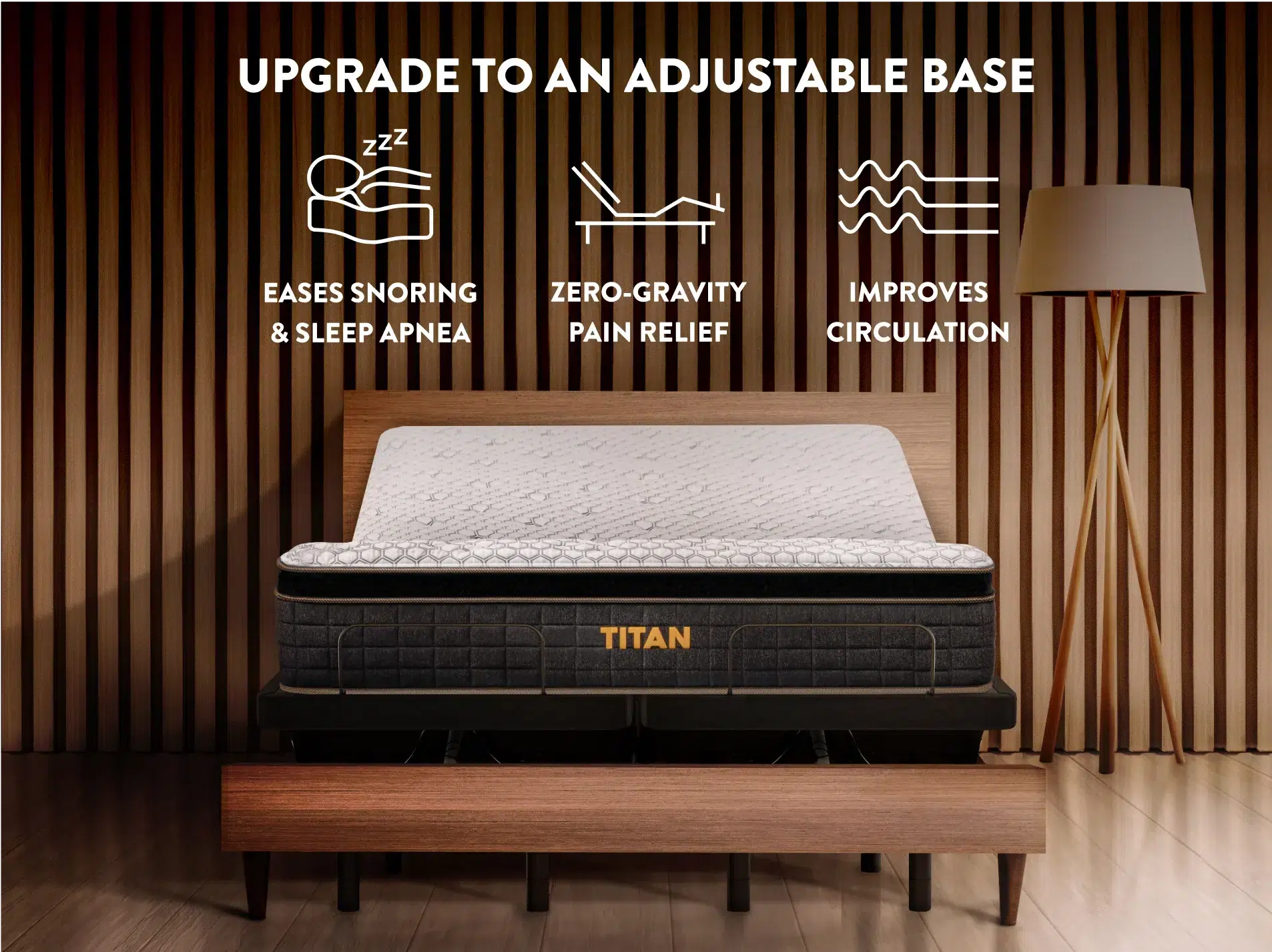 A bed with a Titan Plus Elite mattress on an adjustable base in a stylish bedroom setting. The text above highlights benefits: "Eases Snoring & Sleep Apnea," "Zero-Gravity Pain Relief," and "Improves Circulation." The background features vertical wood paneling.
