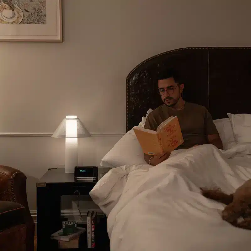 Loftie smart alarm clock on a styled nightstand