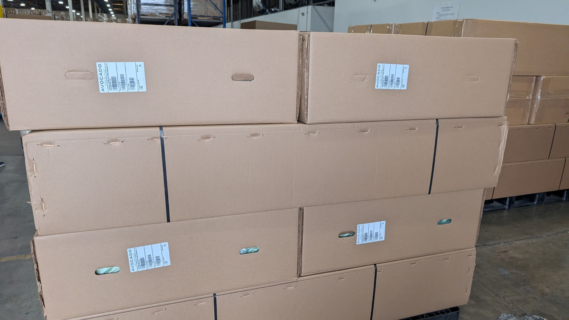 Avocado Grand Luxe mattresses palletized for white-glove delivery